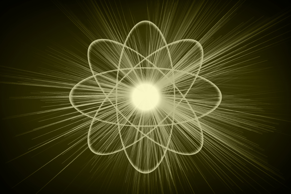 Radiant golden light with orbiting rings